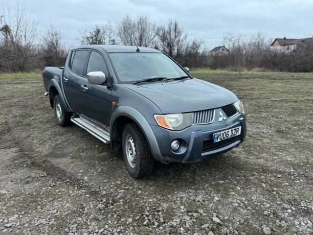 Синий Мицубиси Л 200, объемом двигателя 2.5 л и пробегом 212 тыс. км за 7000 $, фото 1 на Automoto.ua