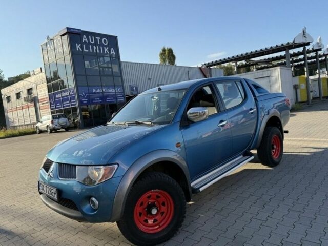 Синий Мицубиси Л 200, объемом двигателя 2.5 л и пробегом 280 тыс. км за 4100 $, фото 1 на Automoto.ua