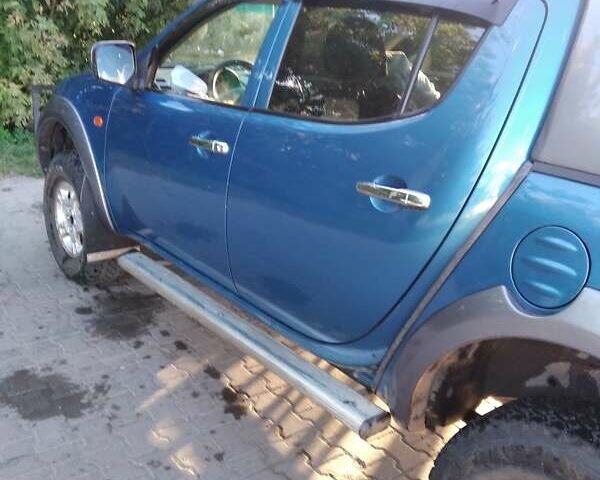 Синій Міцубісі Л 200, об'ємом двигуна 2.48 л та пробігом 224 тис. км за 12350 $, фото 1 на Automoto.ua