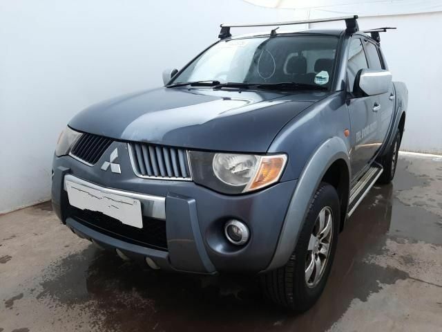 Синий Мицубиси Л 200, объемом двигателя 2.5 л и пробегом 116 тыс. км за 5500 $, фото 1 на Automoto.ua