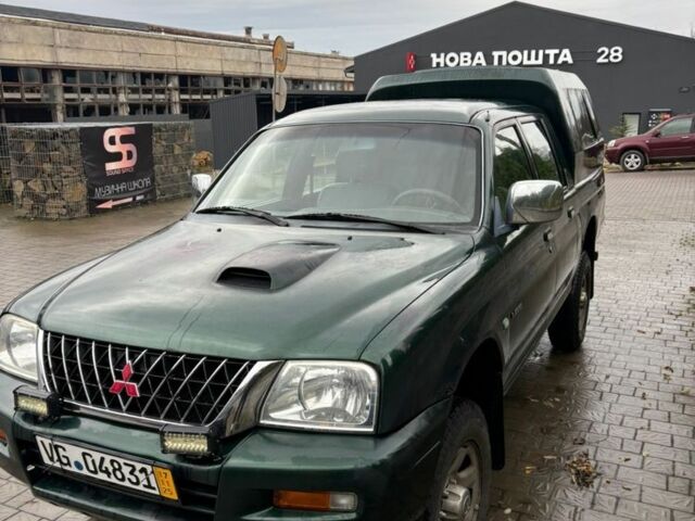 Зеленый Мицубиси Л 200, объемом двигателя 2.5 л и пробегом 380 тыс. км за 4875 $, фото 1 на Automoto.ua