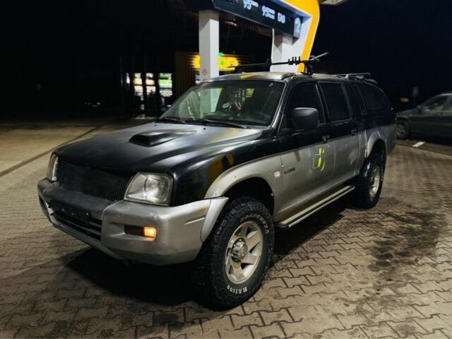 Зеленый Мицубиси Л 200, объемом двигателя 0 л и пробегом 130 тыс. км за 4500 $, фото 1 на Automoto.ua