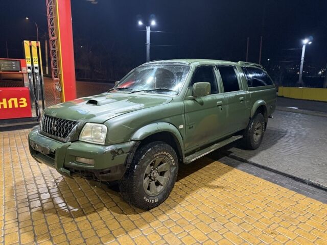 Зеленый Мицубиси Л 200, объемом двигателя 0 л и пробегом 200 тыс. км за 3700 $, фото 1 на Automoto.ua