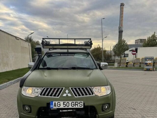 Зеленый Мицубиси Л 200, объемом двигателя 2.5 л и пробегом 242 тыс. км за 2900 $, фото 1 на Automoto.ua