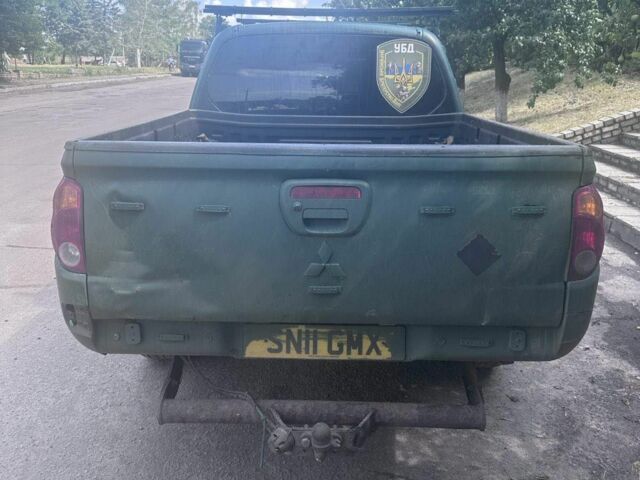 Зеленый Мицубиси Л 200, объемом двигателя 0 л и пробегом 150 тыс. км за 4631 $, фото 1 на Automoto.ua