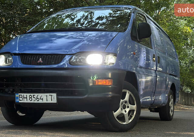 Синий Мицубиси Л 400, объемом двигателя 2.48 л и пробегом 347 тыс. км за 3800 $, фото 1 на Automoto.ua