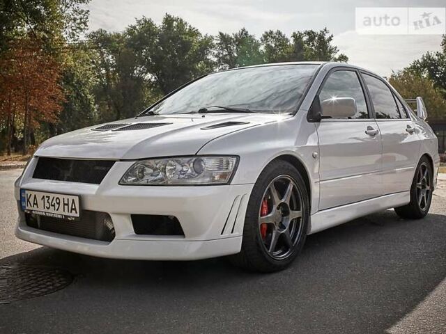Білий Міцубісі Лансер Еволюшн, об'ємом двигуна 2 л та пробігом 169 тис. км за 25000 $, фото 1 на Automoto.ua