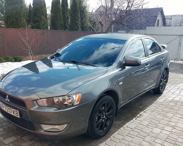 Серый Мицубиси Лансер Эволюшн, объемом двигателя 1.5 л и пробегом 203 тыс. км за 7900 $, фото 1 на Automoto.ua