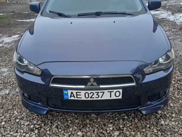 Синий Мицубиси Лансер Эволюшн, объемом двигателя 1.5 л и пробегом 210 тыс. км за 6600 $, фото 1 на Automoto.ua