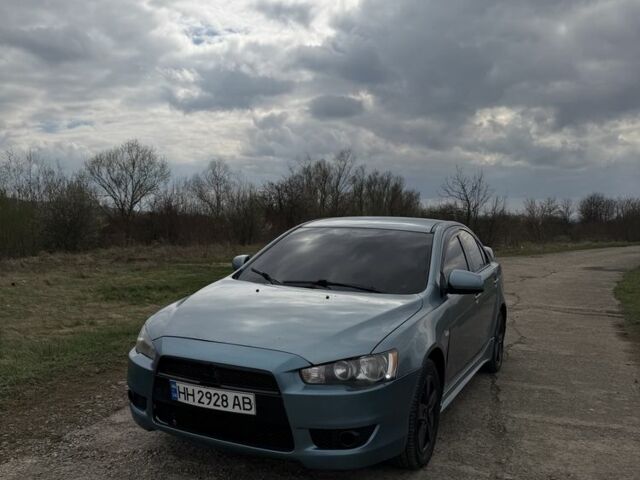 Зелений Міцубісі Лансер Еволюшн, об'ємом двигуна 2 л та пробігом 260 тис. км за 3850 $, фото 1 на Automoto.ua