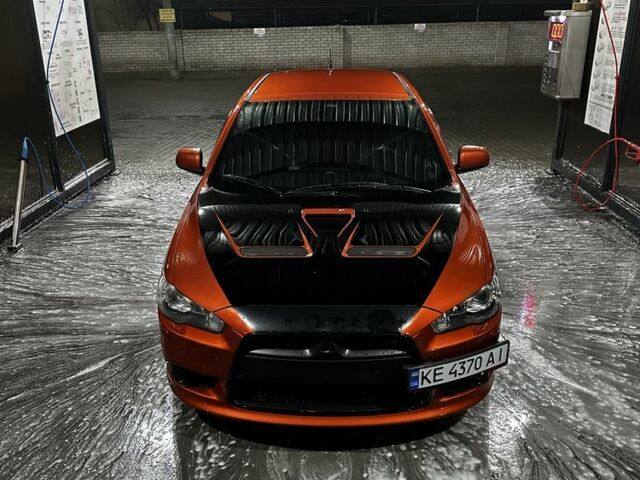 Оранжевый Мицубиси Лансер Спортбэк, объемом двигателя 2 л и пробегом 165 тыс. км за 8000 $, фото 1 на Automoto.ua