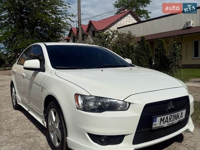 Білий Міцубісі Lancer, об'ємом двигуна 1.8 л та пробігом 270 тис. км за 6700 $, фото 1 на Automoto.ua