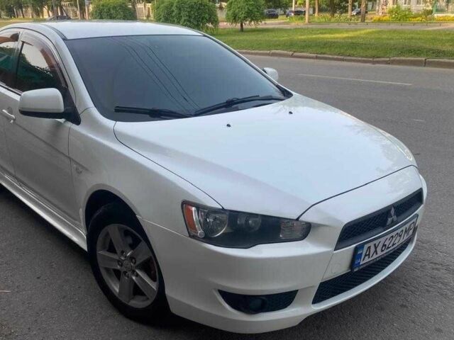 Білий Міцубісі Lancer, об'ємом двигуна 1.8 л та пробігом 230 тис. км за 6500 $, фото 1 на Automoto.ua