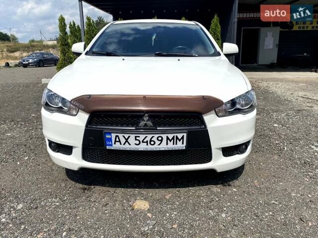 Білий Міцубісі Lancer, об'ємом двигуна 1.8 л та пробігом 238 тис. км за 6000 $, фото 1 на Automoto.ua