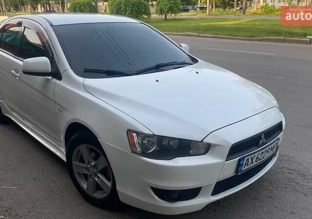 Белый Мицубиси Лансер, объемом двигателя 1.8 л и пробегом 230 тыс. км за 6500 $, фото 1 на Automoto.ua