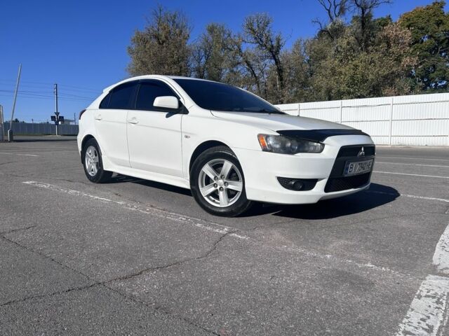 Белый Мицубиси Лансер, объемом двигателя 1.8 л и пробегом 160 тыс. км за 8500 $, фото 1 на Automoto.ua