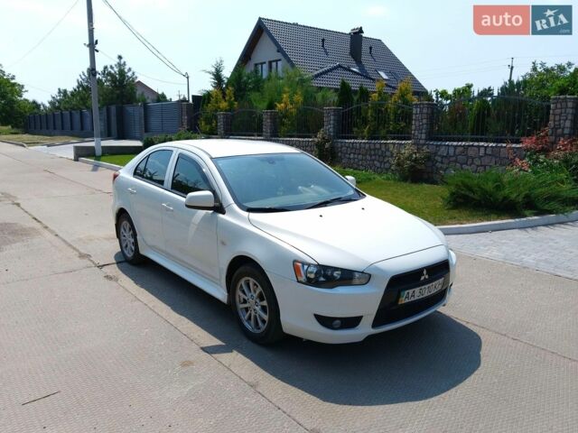 Білий Міцубісі Lancer, об'ємом двигуна 1.8 л та пробігом 228 тис. км за 5500 $, фото 1 на Automoto.ua