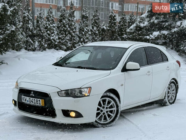 Белый Мицубиси Лансер, объемом двигателя 1.6 л и пробегом 225 тыс. км за 6250 $, фото 1 на Automoto.ua