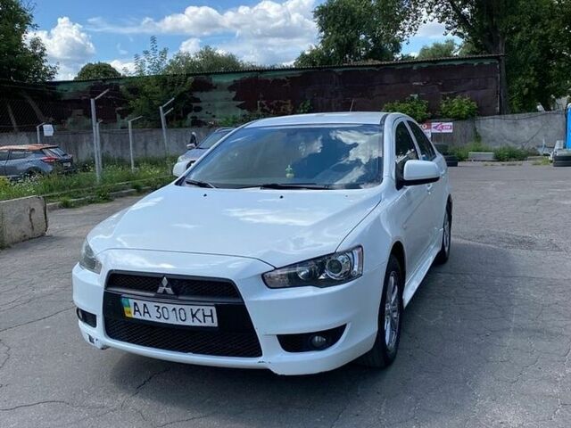 Білий Міцубісі Lancer, об'ємом двигуна 1.8 л та пробігом 228 тис. км за 4900 $, фото 1 на Automoto.ua