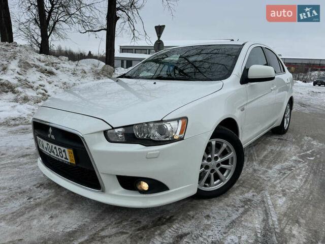 Белый Мицубиси Лансер, объемом двигателя 1.6 л и пробегом 225 тыс. км за 6300 $, фото 1 на Automoto.ua
