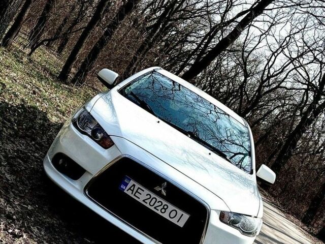 Білий Міцубісі Lancer, об'ємом двигуна 1.8 л та пробігом 220 тис. км за 6500 $, фото 1 на Automoto.ua
