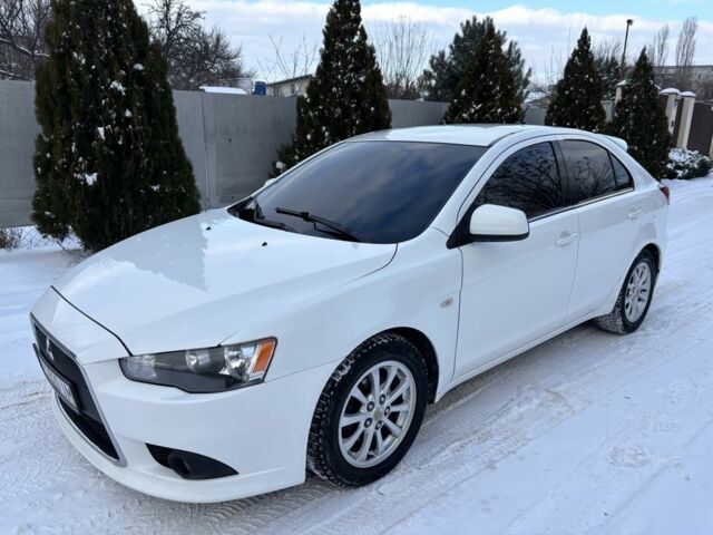 Білий Міцубісі Lancer, об'ємом двигуна 1.8 л та пробігом 173 тис. км за 6200 $, фото 1 на Automoto.ua