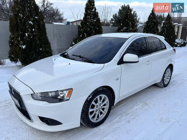 Білий Міцубісі Lancer, об'ємом двигуна 1.8 л та пробігом 173 тис. км за 6200 $, фото 1 на Automoto.ua
