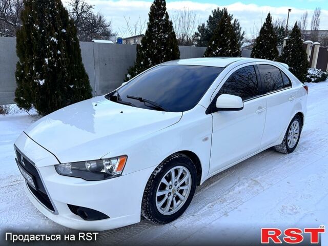 Белый Мицубиси Лансер, объемом двигателя 1.8 л и пробегом 17300 тыс. км за 6200 $, фото 1 на Automoto.ua