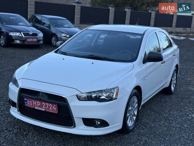 Білий Міцубісі Lancer, об'ємом двигуна 1.6 л та пробігом 207 тис. км за 7200 $, фото 1 на Automoto.ua