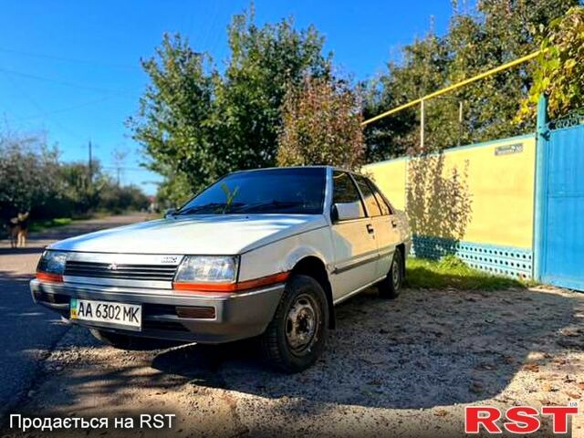 Білий Міцубісі Lancer, об'ємом двигуна 1.5 л та пробігом 0 тис. км за 350 $, фото 1 на Automoto.ua