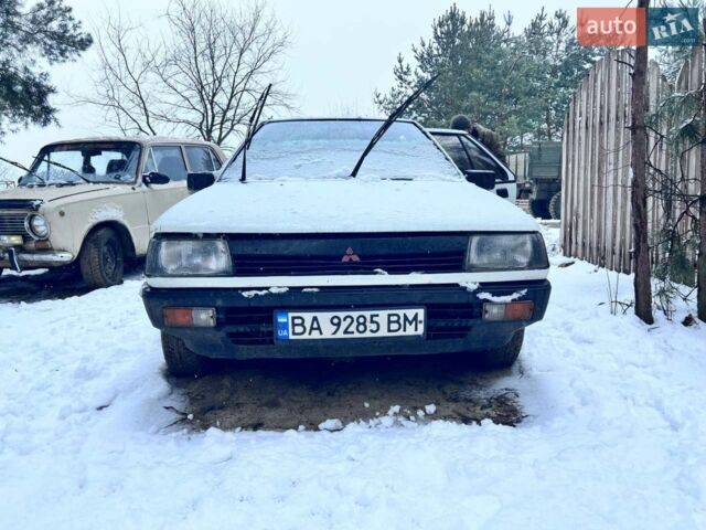 Белый Мицубиси Лансер, объемом двигателя 1.8 л и пробегом 200 тыс. км за 1350 $, фото 1 на Automoto.ua