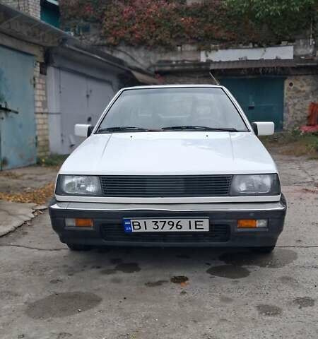 Белый Мицубиси Лансер, объемом двигателя 1.46 л и пробегом 250 тыс. км за 1300 $, фото 1 на Automoto.ua