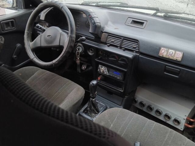 Білий Міцубісі Lancer, об'ємом двигуна 1.3 л та пробігом 345 тис. км за 750 $, фото 1 на Automoto.ua