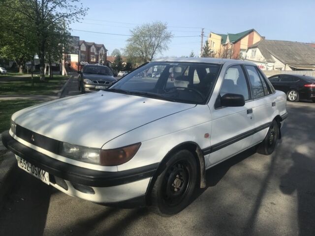 Білий Міцубісі Lancer, об'ємом двигуна 0 л та пробігом 300 тис. км за 1200 $, фото 1 на Automoto.ua