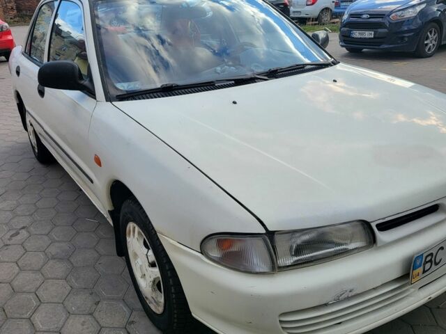 Білий Міцубісі Lancer, об'ємом двигуна 1.3 л та пробігом 280 тис. км за 2750 $, фото 1 на Automoto.ua