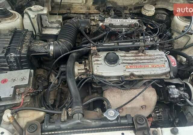 Білий Міцубісі Lancer, об'ємом двигуна 1.3 л та пробігом 300 тис. км за 2300 $, фото 1 на Automoto.ua
