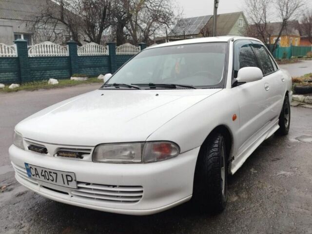 Білий Міцубісі Lancer, об'ємом двигуна 1.3 л та пробігом 300 тис. км за 1700 $, фото 1 на Automoto.ua
