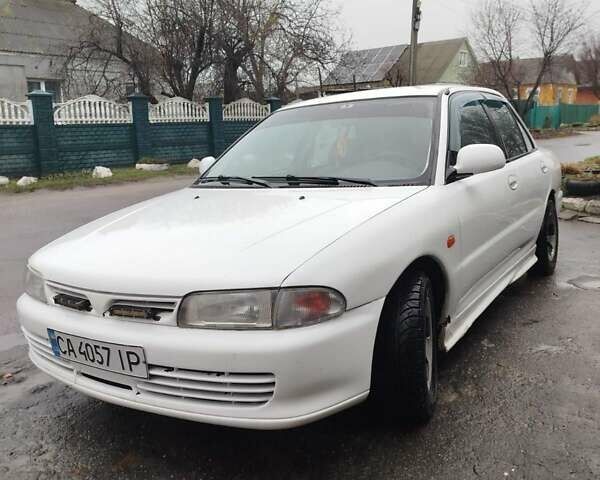 Білий Міцубісі Lancer, об'ємом двигуна 1.3 л та пробігом 300 тис. км за 1700 $, фото 1 на Automoto.ua