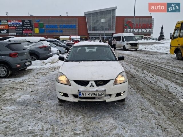 Белый Мицубиси Лансер, объемом двигателя 1.6 л и пробегом 333 тыс. км за 2500 $, фото 1 на Automoto.ua