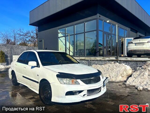 Білий Міцубісі Lancer, об'ємом двигуна 1.6 л та пробігом 360 тис. км за 3600 $, фото 1 на Automoto.ua