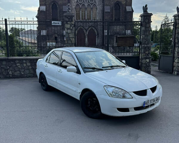 Белый Мицубиси Лансер, объемом двигателя 1.58 л и пробегом 8 тыс. км за 3700 $, фото 1 на Automoto.ua