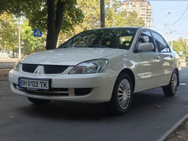 Білий Міцубісі Lancer, об'ємом двигуна 1.6 л та пробігом 400 тис. км за 4100 $, фото 1 на Automoto.ua