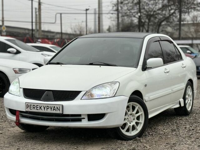 Білий Міцубісі Lancer, об'ємом двигуна 1.6 л та пробігом 301 тис. км за 3300 $, фото 1 на Automoto.ua