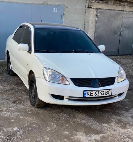 Белый Мицубиси Лансер, объемом двигателя 1.6 л и пробегом 250 тыс. км за 2999 $, фото 1 на Automoto.ua