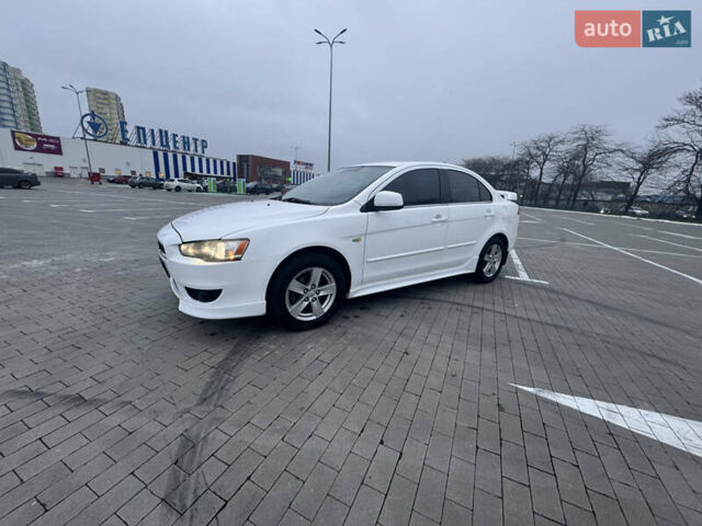 Белый Мицубиси Лансер, объемом двигателя 1.5 л и пробегом 314 тыс. км за 6500 $, фото 1 на Automoto.ua