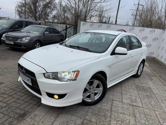 Белый Мицубиси Лансер, объемом двигателя 2 л и пробегом 240 тыс. км за 6700 $, фото 1 на Automoto.ua