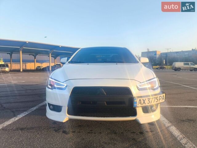 Білий Міцубісі Lancer, об'ємом двигуна 2 л та пробігом 172 тис. км за 6700 $, фото 1 на Automoto.ua