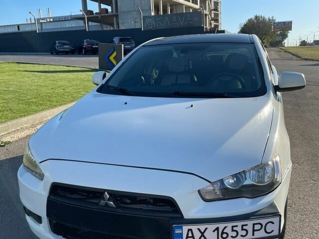 Білий Міцубісі Lancer, об'ємом двигуна 2 л та пробігом 232 тис. км за 6350 $, фото 1 на Automoto.ua