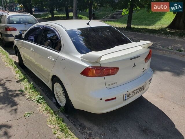 Білий Міцубісі Lancer, об'ємом двигуна 2 л та пробігом 190 тис. км за 4700 $, фото 1 на Automoto.ua