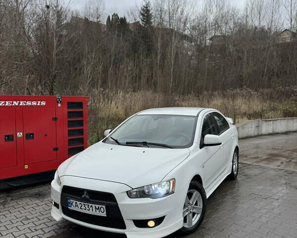 Белый Мицубиси Лансер, объемом двигателя 2 л и пробегом 259 тыс. км за 6300 $, фото 1 на Automoto.ua